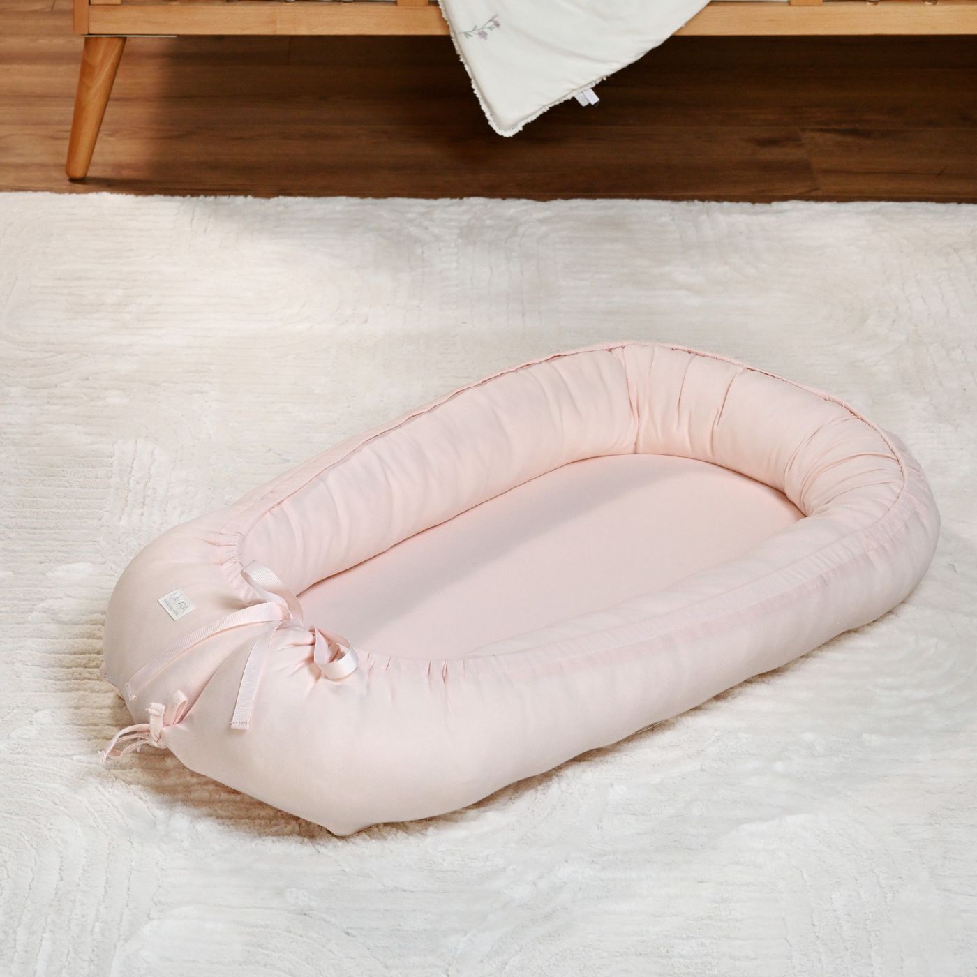 בייבי נסט חלק ג’רזי ורוד Cozy